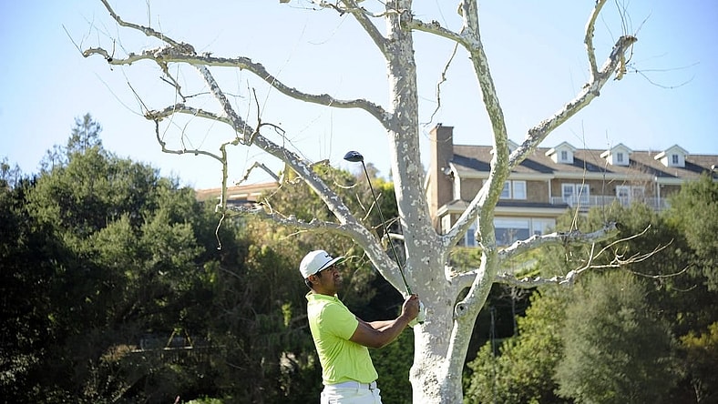 Feb 21, 2021; Pacific Palisades, California, USA; Tony Finau hits from the seventeenth hole tee box during the final round of The Genesis Invitational golf tournament at Riviera Country Club. Mandatory Credit: Gary A. Vasquez-USA TODAY Sports