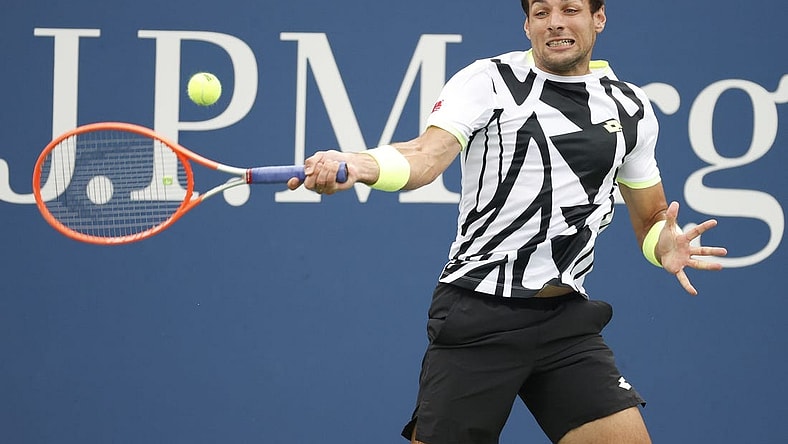 Sep 1, 2021; Flushing, NY, USA; Bernabe Zapata Miralles of Spain hits a shot against Felix Auger-Aliassime of Canada in a second round match on day three of the 2021 U.S. Open tennis tournament at USTA Billie Jean King National Tennis Center. Mandatory Credit: Jerry Lai-USA TODAY Sports