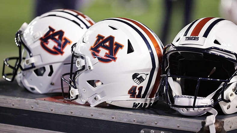 Oct 2, 2021; Baton Rouge, Louisiana, USA; Auburn Tigers helmets sits on a crate during a game against LSU Tigers at Tiger Stadium. Mandatory Credit: Stephen Lew-USA TODAY Sports