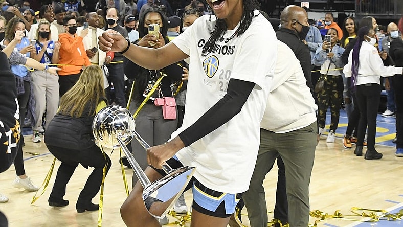 Oct 17, 2021; Chicago, Illinois, USA; Chicago Sky guard Diamond DeShields, dances with the championship trophy after the Chicago Sky beat the Phoenix Mercury 80-74 in game four of the 2021 WNBA Finals at Wintrust Arena. Mandatory Credit: Matt Marton-USA TODAY Sports
