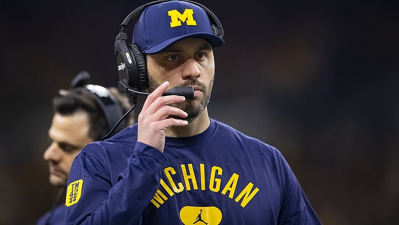 Dec 4, 2021; Indianapolis, IN, USA; Michigan Wolverines quarterbacks coach Matt Weiss against the Iowa Hawkeyes in the Big Ten Conference championship game at Lucas Oil Stadium. Mandatory Credit: Mark J. Rebilas-USA TODAY Sports