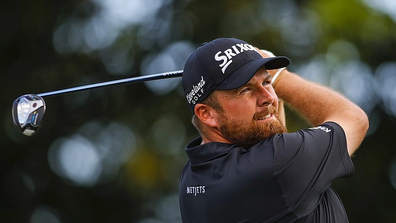 Feb 27, 2022; Palm Beach Gardens, Florida, USA; Shane Lowry plays his shot from the 14th tee during the final round of The Honda Classic golf tournament. Mandatory Credit: Sam Navarro-USA TODAY Sports