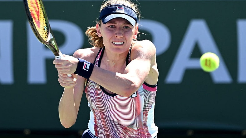 Mar 11, 2022; Indian Wells, CA, USA; Ekaterina Alexandrova (RUS) hits a shot in her 2nd round match against Simona Halep (ROU) at the BNP Paribas Open at the Indian Wells Tennis Garden. Mandatory Credit: Jayne Kamin-Oncea-USA TODAY Sports
