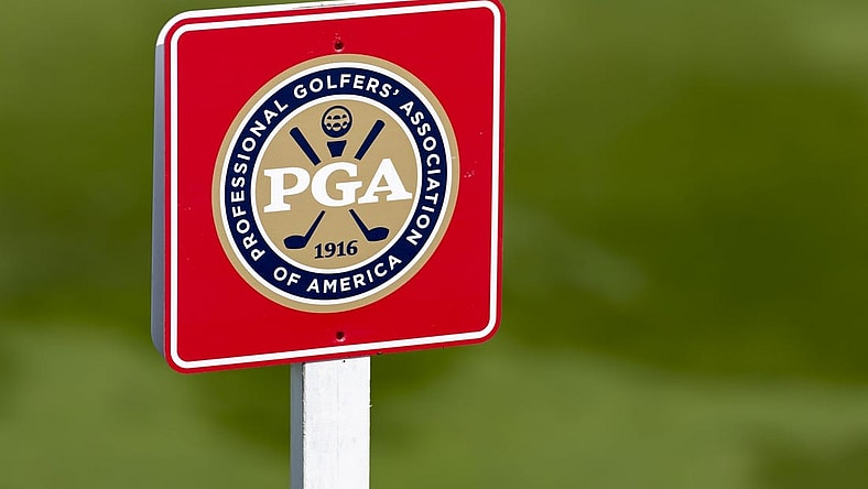 May 26, 2022; Benton Harbor, Michigan, USA; A PGA of America sign stands near the eighth tee box during the first round of the 2022 KitchenAid Senior PGA Championship at Harbor Shores. Mandatory Credit: Raj Mehta-USA TODAY Sports