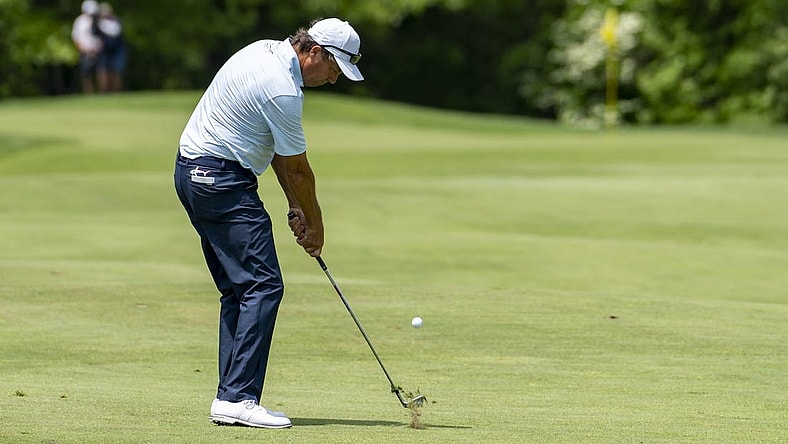 May 29, 2022; Benton Harbor, Michigan, USA; Stephen Ames hits his approach shot from the first fairway during the final round of the 2022 KitchenAid Senior PGA Championship at Harbor Shores. Mandatory Credit: Raj Mehta-USA TODAY Sports