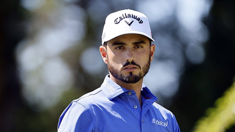 Jul 1, 2022; Portland, Oregon, USA; Abraham Ancer and look on from the sixth tee box during the second round of the LIV Golf tournament at Pumpkin Ridge Golf Club. Mandatory Credit: Soobum Im-USA TODAY Sports
