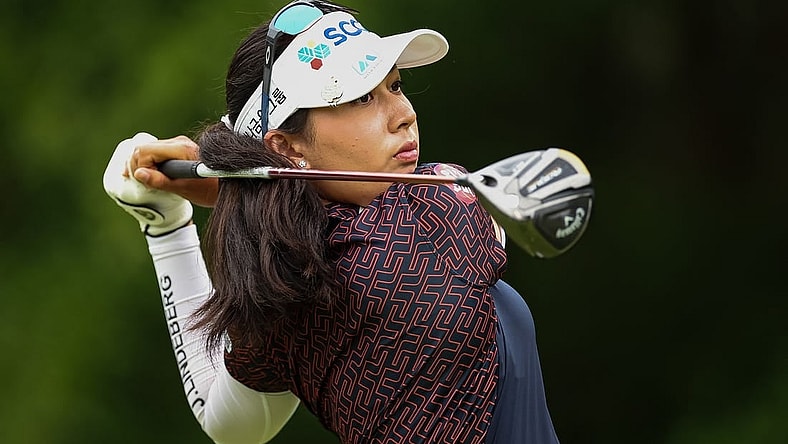 Jun 23, 2022; Bethesda, Maryland, USA; Atthaya Thitikul plays her shot from the 11th tee during the first round of the KPMG Women's PGA Championship golf tournament at Congressional Country Club. Mandatory Credit: Scott Taetsch-USA TODAY Sports