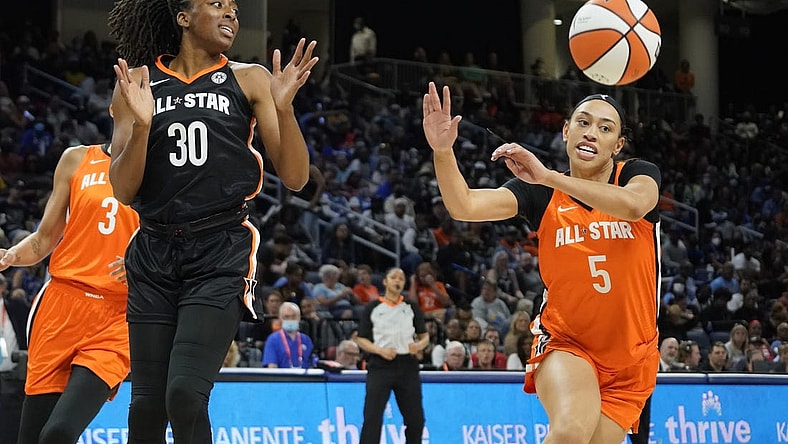 Jul 10, 2022; Chicago, Ill, USA; Team Stewart center Nneka Ogwumike (3) and Team Wilson guard Dearica Hammy (5) go for the ball during the first half in a WNBA All Star Game at Wintrust Arena. Mandatory Credit: David Banks-USA TODAY Sports