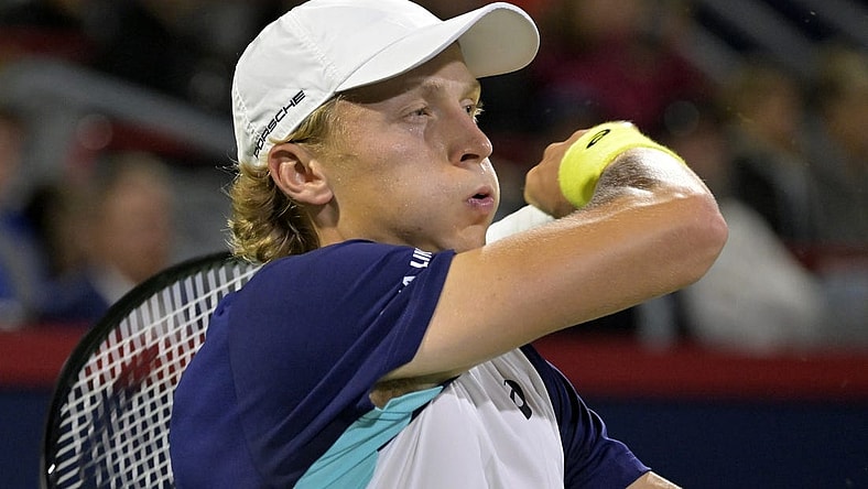 Aug 9, 2022; Montreal, QC, Canada; Emil Ruusuvuori (FIN) hits a forehand against Hubert Hurkacz (POL) (not pictured) in second round play in the National Bank Open at IGA Stadium. Mandatory Credit: Eric Bolte-USA TODAY Sports