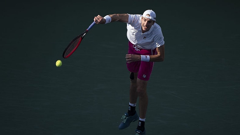 Aug 19, 2022; Cincinnati, OH, USA; John Isner (USA) serves the ball during his match against Stefanos Tsitsipas (GRE) at the Western & Southern Open at the Lindner Family Tennis Center. Mandatory Credit: Susan Mullane-USA TODAY Sports