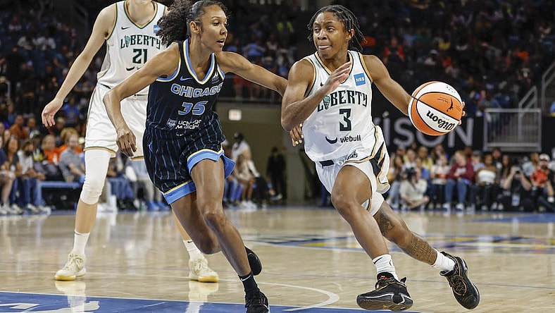 Aug 20, 2022; Chicago, Illinois, USA; New York Liberty guard Crystal Dangerfield (3) drives to the basket against Chicago Sky guard Rebekah Gardner (35) during the second half of Game 2 of the first round of the WNBA playoffs at Wintrust Arena. Mandatory Credit: Kamil Krzaczynski-USA TODAY Sports