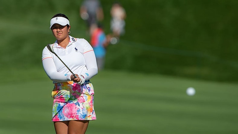 Aug 27, 2022; Ottawa, Ontario, CAN; Lilia Vu from the United States  follows the ball as she gets it onto the green of the 18th hole during the third round of the CP Women's Open golf tournament. Mandatory Credit: Marc DesRosiers-USA TODAY Sports