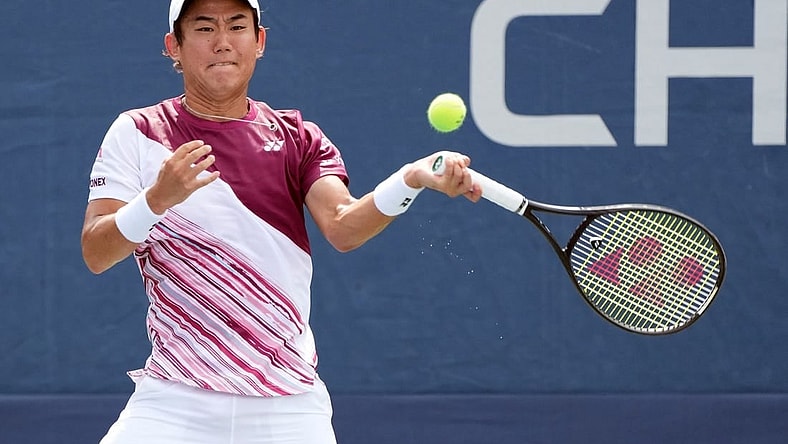 Aug 29, 2022; Flushing, NY, USA; Yoshihito Nishioka of Japan hits a shot against Alejandro Davidovich Fokina of Spain on day one of the 2022 U.S. Open tennis tournament at USTA Billie Jean King National Tennis Center. Mandatory Credit: Jerry Lai-USA TODAY Sports