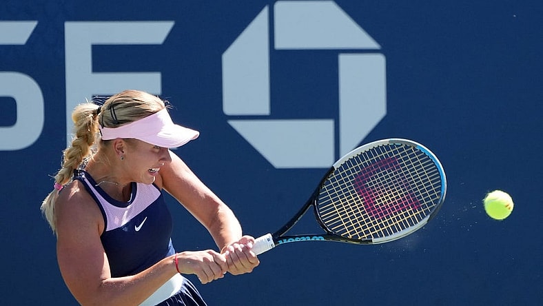 Sep 1, 2022; Flushing, NY, USA;  Anastasia Potapova hits the ball against Qinwen Zheng of China on day four of the 2022 U.S. Open tennis tournament at USTA Billie Jean King Tennis Center. Mandatory Credit: Jerry Lai-USA TODAY Sports