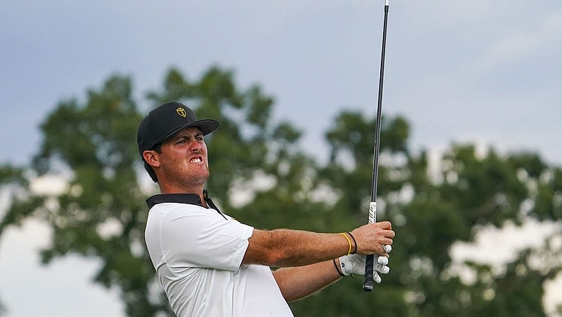 Sep 22, 2022; Charlotte, North Carolina, USA; International Team golfer Mito Pereira hits his tee shot on the 14th hole during the foursomes match play of the Presidents Cup golf tournament at Quail Hollow Club. Mandatory Credit: Peter Casey-USA TODAY Sports