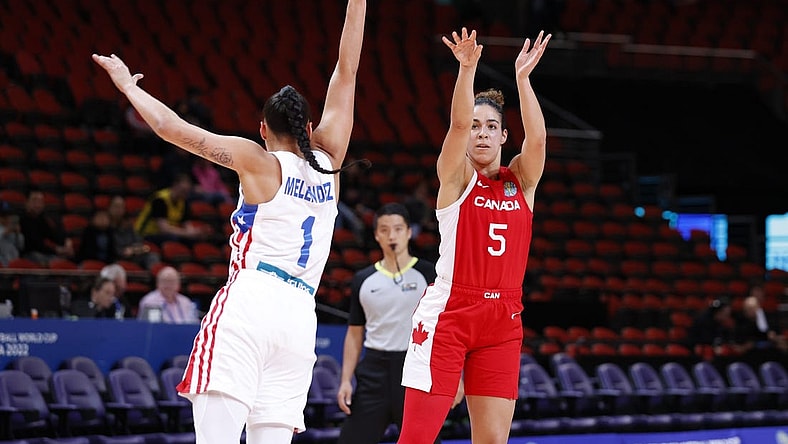 Sep 29, 2022; Sydney,  AUS; Canada player Kia Nurse (5) takes shot against Puerto Rico player Tayra Melendez (1) in second half at Sydney SuperDome. Mandatory Credit: Yukihito Taguchi-USA TODAY Sports
