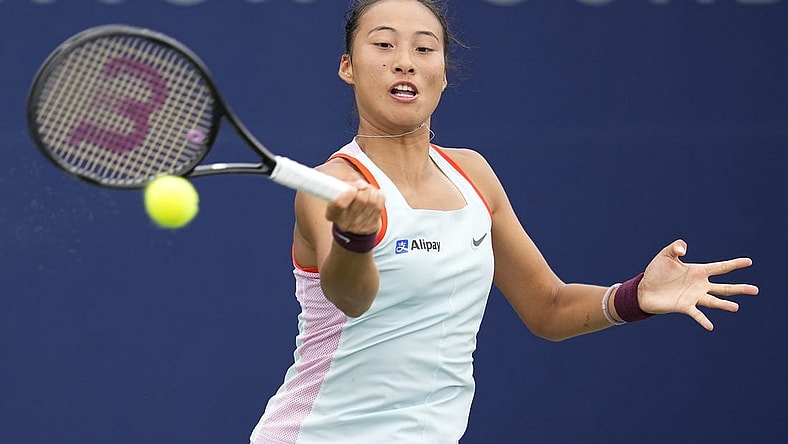 Oct 13, 2022; San Diego, California, US;  Qinwen Zheng of China hits the ball against Iga Swiatek of Poland during the San Diego Open at Barnes Tennis Center. Mandatory Credit: Ray Acevedo-USA TODAY Sports