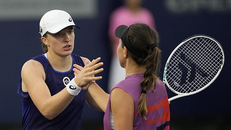 Oct 15, 2022; San Diego, California, US;  Iga Swiatek of Poland (left) greets Jessica Pegula of the United States after her win during the San Diego Open at Barnes Tennis Center. Mandatory Credit: Ray Acevedo-USA TODAY Sports