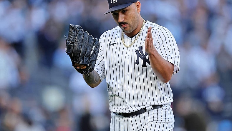 Oct 18, 2022; Bronx, New York, USA; New York Yankees starting pitcher Nestor Cortes (65) reacts after pitching against the Cleveland Guardians during the third inning in game five of the ALDS for the 2022 MLB Playoffs at Yankee Stadium. Mandatory Credit: Brad Penner-USA TODAY Sports