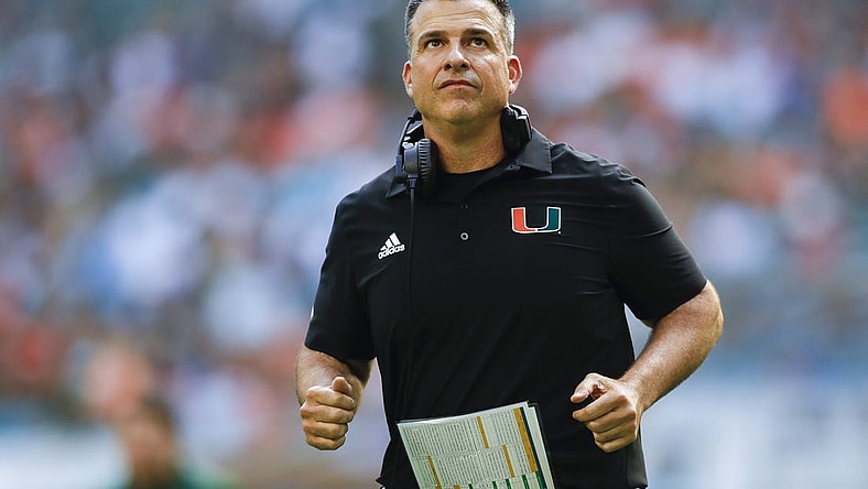 Oct 22, 2022; Miami Gardens, Florida, USA; Miami Hurricanes head coach Mario Cristobal runs on the field during the third quarter against the Duke Blue Devils at Hard Rock Stadium. Mandatory Credit: Sam Navarro-USA TODAY Sports