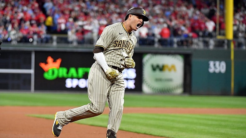 Oct 22, 2022; Philadelphia, Pennsylvania, USA; San Diego Padres third baseman Manny Machado (13) reacts after hitting a home run in the first inning during game four of the NLCS against the Philadelphia Phillies for the 2022 MLB Playoffs at Citizens Bank Park.Mandatory Credit: Eric Hartline-USA TODAY Sports