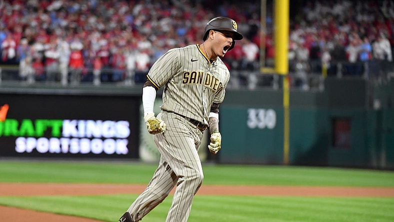 Oct 22, 2022; Philadelphia, Pennsylvania, USA; San Diego Padres third baseman Manny Machado (13) reacts after hitting a home run in the first inning during game four of the NLCS against the Philadelphia Phillies for the 2022 MLB Playoffs at Citizens Bank Park.Mandatory Credit: Eric Hartline-USA TODAY Sports