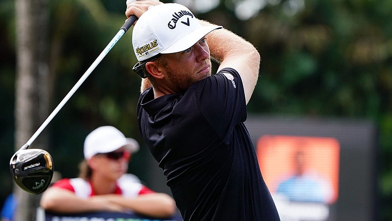 Oct 30, 2022; Miami, Florida, USA; Talor Gooch plays his shot on the 12th tee during the final round of the season finale of the LIV Golf series at Trump National Doral. Mandatory Credit: John David Mercer-USA TODAY Sports