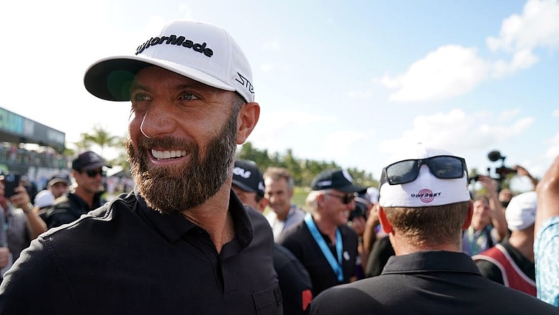 Oct 30, 2022; Miami, Florida, USA; Dustin Johnson celebrates with team 4Aces GC after winning the season finale of the LIV Golf series at Trump National Doral. Mandatory Credit: John David Mercer-USA TODAY Sports