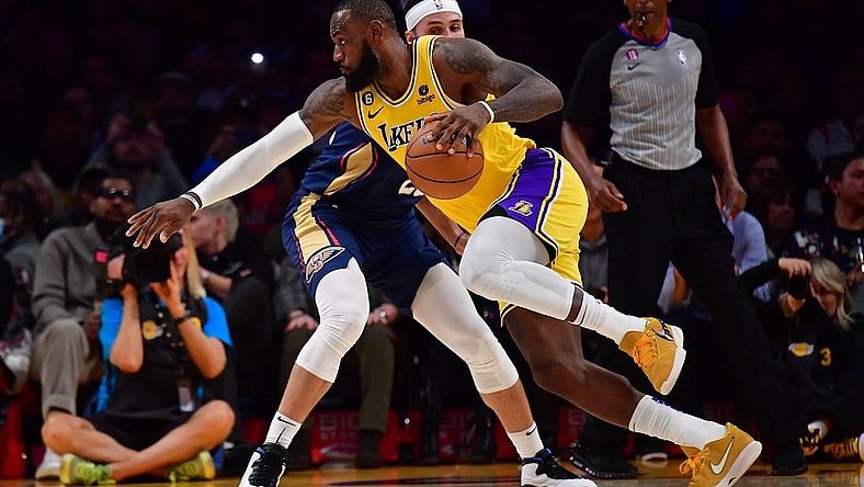 Nov 2, 2022; Los Angeles, California, USA; Los Angeles Lakers forward LeBron James (6) moves to the basket against New Orleans Pelicans forward Larry Nance Jr. (22) during the second half at Crypto.com Arena. Mandatory Credit: Gary A. Vasquez-USA TODAY Sports