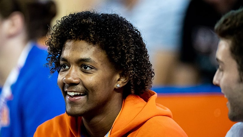 Florida Gators recruit Jaden Rashada smiles on the sideline during the second half against the Florida Gators at Steve Spurrier Field at Ben Hill Griffin Stadium in Gainesville, FL on Saturday, November 12, 2022. [Matt Pendleton/Gainesville Sun]

Ncaa Football Florida Gators Vs South Carolina Gamecocks