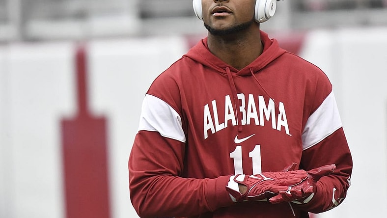 Nov 26, 2022; Tuscaloosa, Alabama, USA; Alabama wide receiver Traeshon Holden (11) goes through his pregame routine before the Crimson Tide faces Auburn at Bryant-Denny Stadium. Mandatory Credit: Gary Cosby Jr.-USA TODAY Sports
