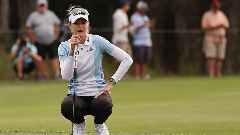 Dec 17, 2022; Orlando, Florida, USA;  Nelly Korda lines up her putt on the ninth green during the first round of the PNC Championship golf tournament at Ritz Carlton Golf Club Grande Lakes Orlando Course. Mandatory Credit: Reinhold Matay-USA TODAY Sports