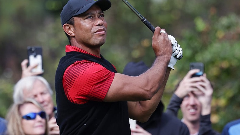 Dec 18, 2022; Orlando, Florida, USA; Tiger Woods watches his drive on the third hole during the final round of the PNC Championship golf tournament at Ritz Carlton Golf Club Grande Lakes Orlando Course. Mandatory Credit: Reinhold Matay-USA TODAY Sports