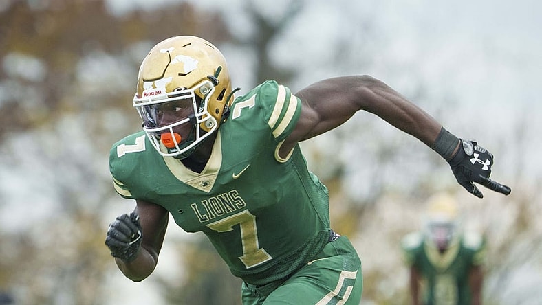 Nov 12, 2022; Washington, DC, USA; Archbishop Carroll High School player Nyckoles Harbor (7) during the game as Archbishop Carroll High School defeated Bishop O'Connell High School 48-6 in WCAC Semi-Finals game at Bishop O'Connell High School. Mandatory Credit: Jack Gruber-USA TODAY