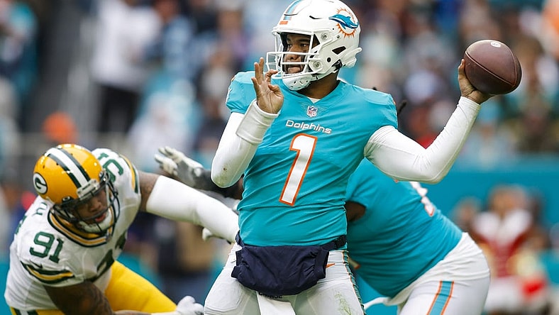Dec 25, 2022; Miami Gardens, Florida, USA; Miami Dolphins quarterback Tua Tagovailoa (1) throws the football during the fourth quarter against the Green Bay Packers at Hard Rock Stadium. Mandatory Credit: Sam Navarro-USA TODAY Sports