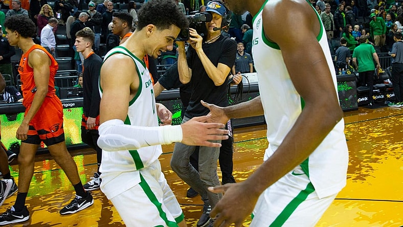 Oregon's Will Richardson, left, is congratulated by N'Faly Dante after leading the Ducks to a win over Oregon State at Matthew Knight Arena Saturday, Dec 31, 2022 in Eugene, Oregon, USA.

Ncaa Basketball Oregon Vs Osu Oregon State At Oregon