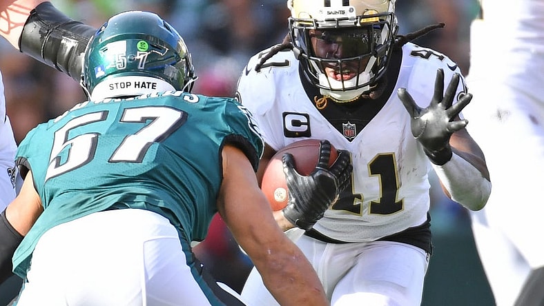 Jan 1, 2023; Philadelphia, Pennsylvania, USA; New Orleans Saints running back Alvin Kamara (41) carries the ball against Philadelphia Eagles linebacker T.J. Edwards (57) during the second quarter at Lincoln Financial Field. Mandatory Credit: Eric Hartline-USA TODAY Sports