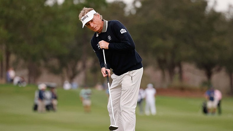 Dec 17, 2022; Orlando, Florida, USA;  Bernhard Langer putts on the 18th green during the first round of the PNC Championship golf tournament at Ritz Carlton Golf Club Grande Lakes Orlando Course. Mandatory Credit: Reinhold Matay-USA TODAY Sports