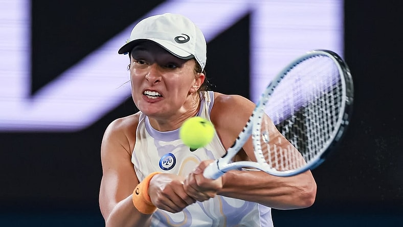 Jan 18, 2023; Melbourne, Victoria, Australia; Iga Swiatek during her second round match against Camila Osorio on day three of the 2023 Australian Open tennis tournament at Melbourne Park. Mandatory Credit: Mike Frey-USA TODAY Sports