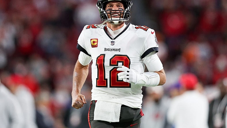 Jan 16, 2023; Tampa, Florida, USA; Tampa Bay Buccaneers quarterback Tom Brady (12) takes the field before a wild card game against the Dallas Cowboys at Raymond James Stadium. Mandatory Credit: Nathan Ray Seebeck-USA TODAY Sports