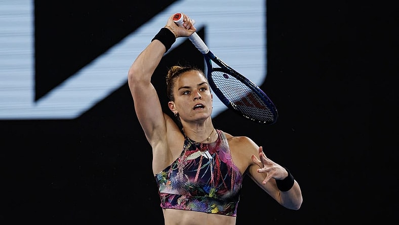 Jan 20, 2023; Melbourne, Victoria, Australia; Maria Sakkari of Greece hits a shot against  Zhu Lin of China on day five of the 2023 Australian Open tennis tournament at Melbourne Park. Mandatory Credit: Mike Frey-USA TODAY Sports