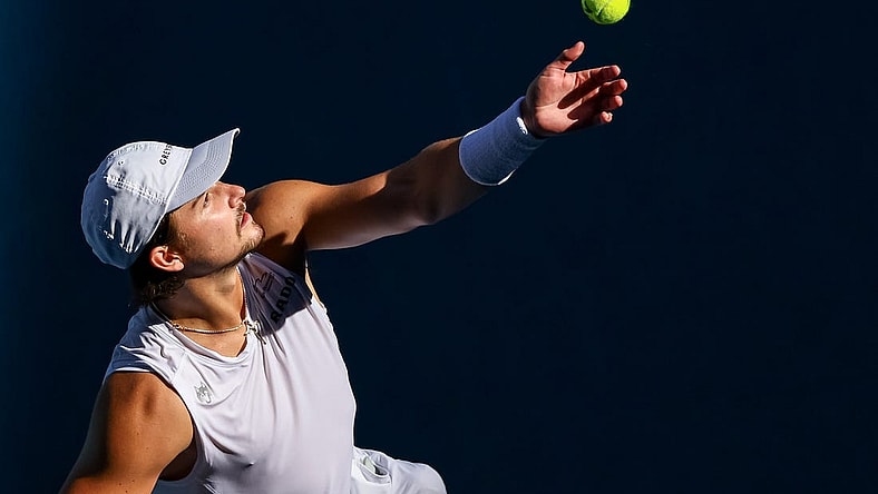 Jan 23, 2023; Melbourne, Victoria, Australia; J.J Wolf from the United States during his round four match against Ben Shelton from the United States on day eight of the 2023 Australian Open tennis tournament at Melbourne Park. Mandatory Credit: Mike Frey-USA TODAY Sports