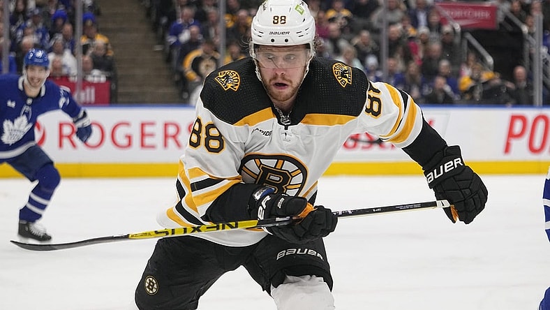 Feb 1, 2023; Toronto, Ontario, CAN; Boston Bruins forward David Pastrnak (88) skates against the Toronto Maple Leafs during the third period at Scotiabank Arena. Mandatory Credit: John E. Sokolowski-USA TODAY Sports