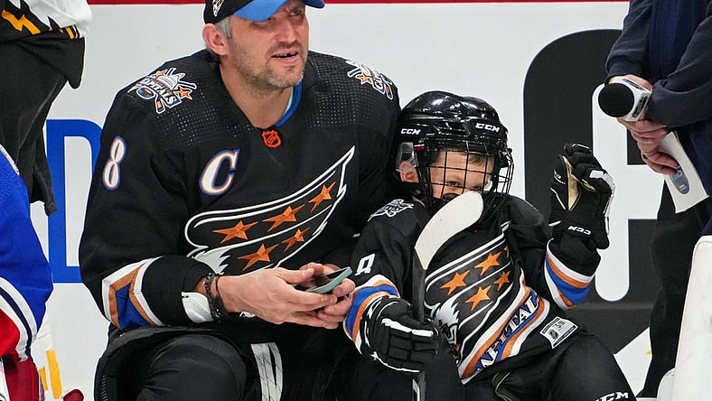 Feb 3, 2023; Sunrise, Florida, USA; Washington Capitals left wing Alex Ovechkin (8) with his son Sergei during the 2023 NHL All-Star Skills Competition at FLA Live Arena. Mandatory Credit: Jasen Vinlove-USA TODAY Sports