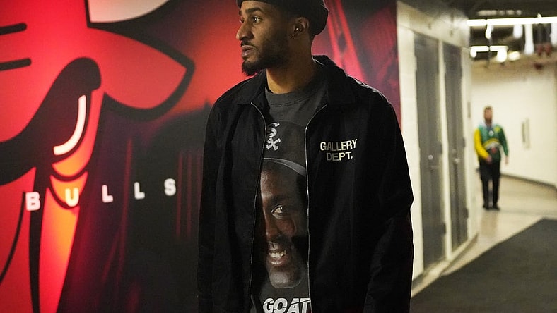 Feb 4, 2023; Chicago, Illinois, USA; Portland Trail Blazers guard Gary Payton II (00) enters the building before the game against the Chicago Bulls at United Center. Mandatory Credit: David Banks-USA TODAY Sports