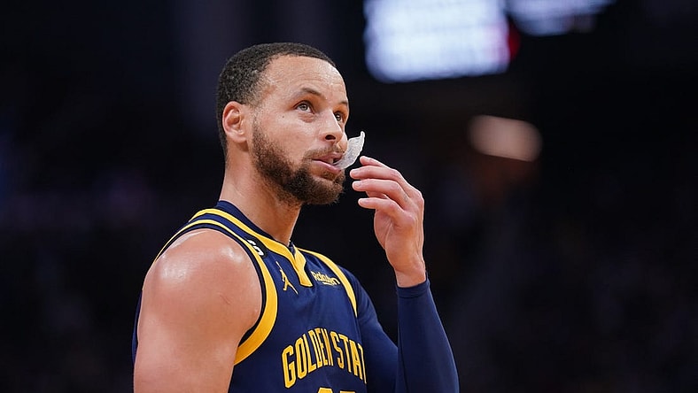 Feb 4, 2023; San Francisco, California, USA; Golden State Warriors guard Stephen Curry (30) stands on the court during a break in the action against the Dallas Mavericks in the third quarter at the Chase Center. Mandatory Credit: Cary Edmondson-USA TODAY Sports