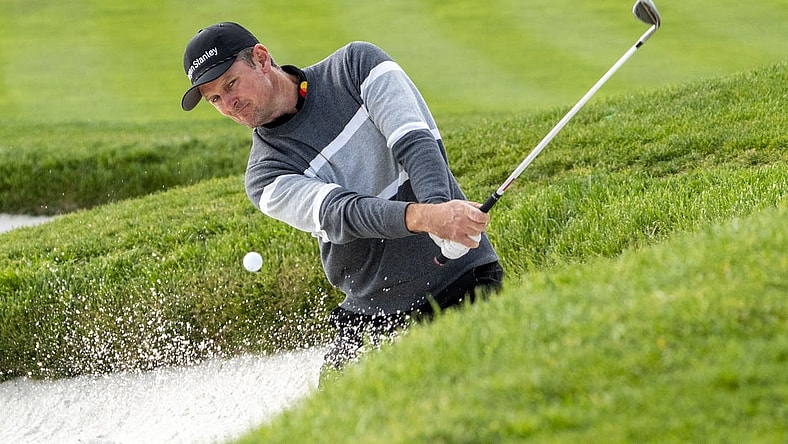 February 5, 2023; Pebble Beach, California, USA; Justin Rose hits his bunker shot on the second hole during the final round of the AT&T Pebble Beach Pro-Am golf tournament at Pebble Beach Golf Links. Mandatory Credit: Kyle Terada-USA TODAY Sports