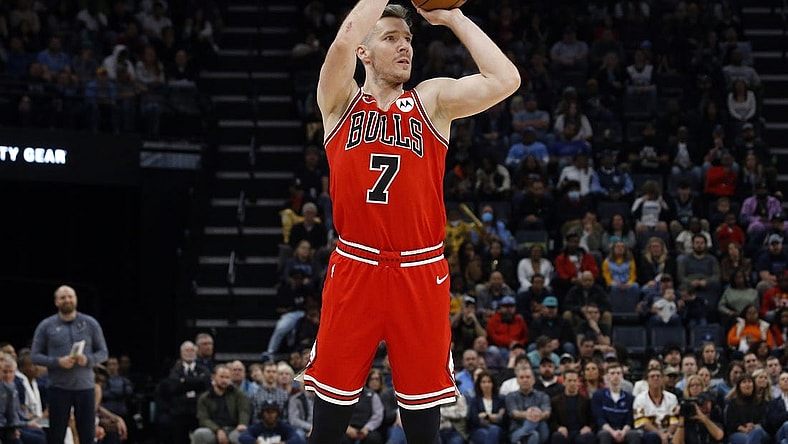 Feb 7, 2023; Memphis, Tennessee, USA; Chicago Bulls guard Goran Dragic (7) attempts a three-point shot during the second half against the Memphis Grizzlies at FedExForum. Mandatory Credit: Petre Thomas-USA TODAY Sports