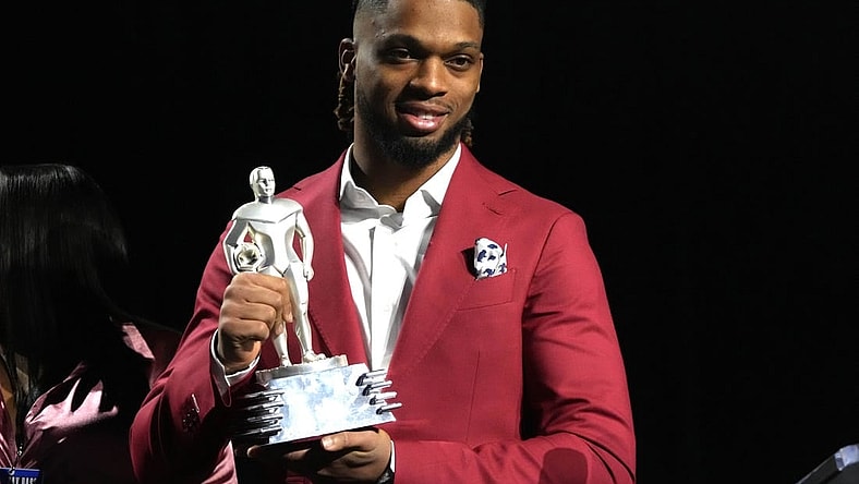 Feb 8, 2023; Phoenix, AZ, USA; Buffalo Bills safety Damar Hamlin accepts the Alan Page Community Award during the NFLPA press conference at the Phoenix Convention Center. Mandatory Credit: Kirby Lee-USA TODAY Sports
