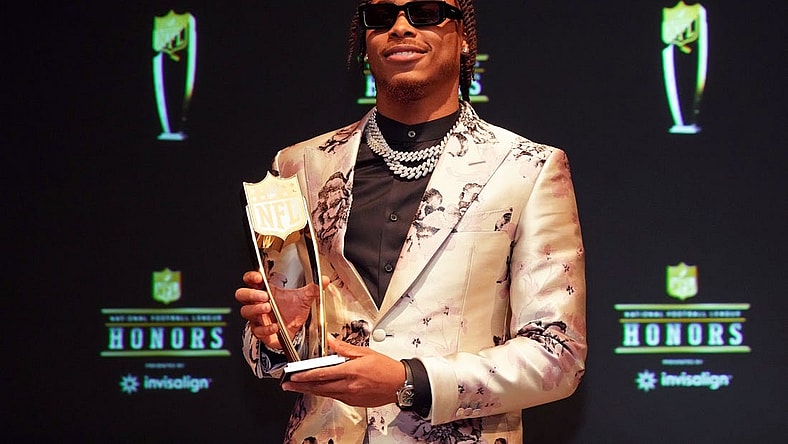 Feb 9, 2023; Phoenix, Arizona, US; Minnesota Vikings wide receiver Justin Jefferson poses for a photo after receiving the award for AP Offensive Player during the NFL Honors award show at Symphony Hall. Mandatory Credit: Kirby Lee-USA TODAY Sports